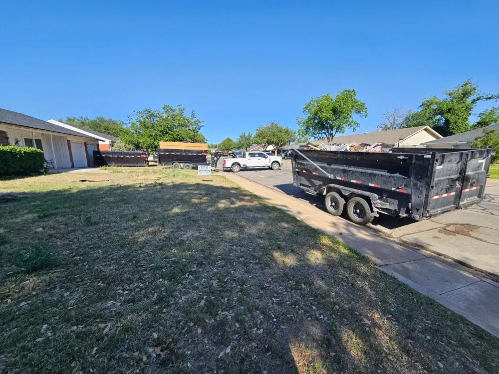 Big Fish Rentals roll-off container set down on a residential property in West Odessa, Texas.